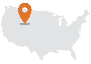 Gray United States map with orange navigation icon.