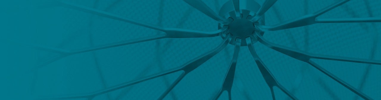 Close up view of the WATCHMAN implant on a blue background