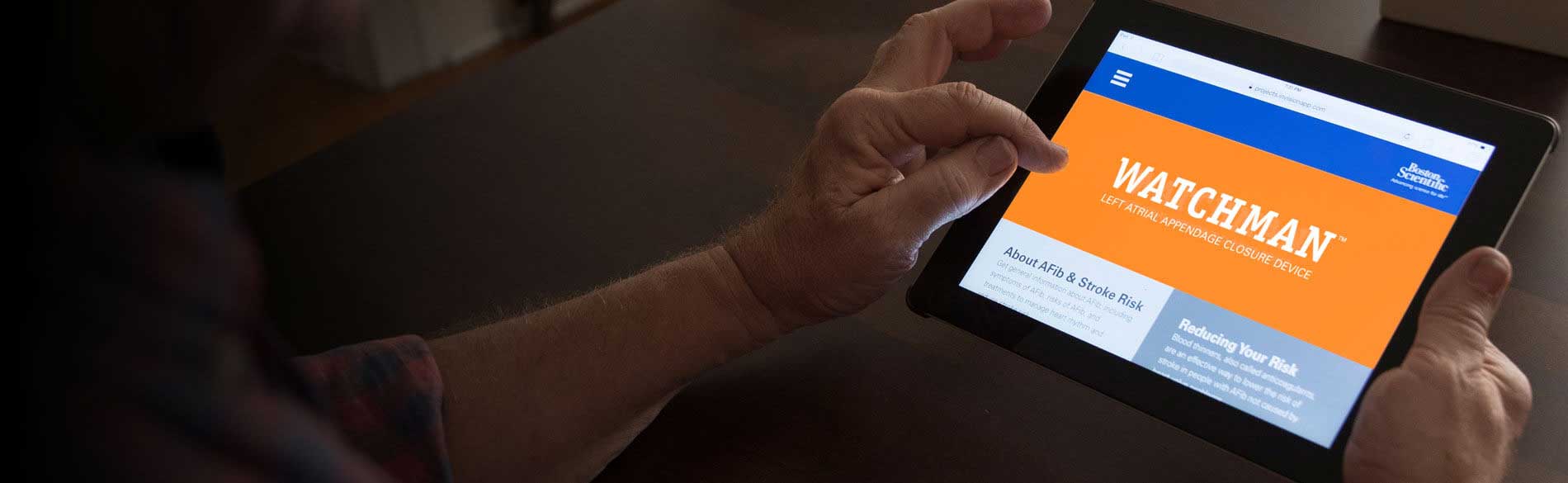 Patient with WATCHMAN website on tablet