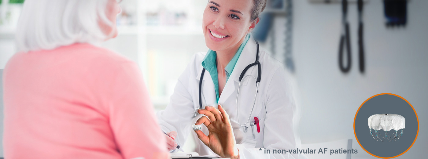 Female Doctor speaking with woman patient