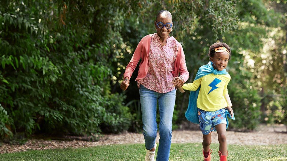 Woman and young relative enjoying the outdoors.